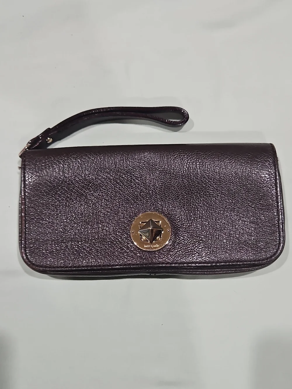 kate spade leather wristlet In Brown with gold hardware
